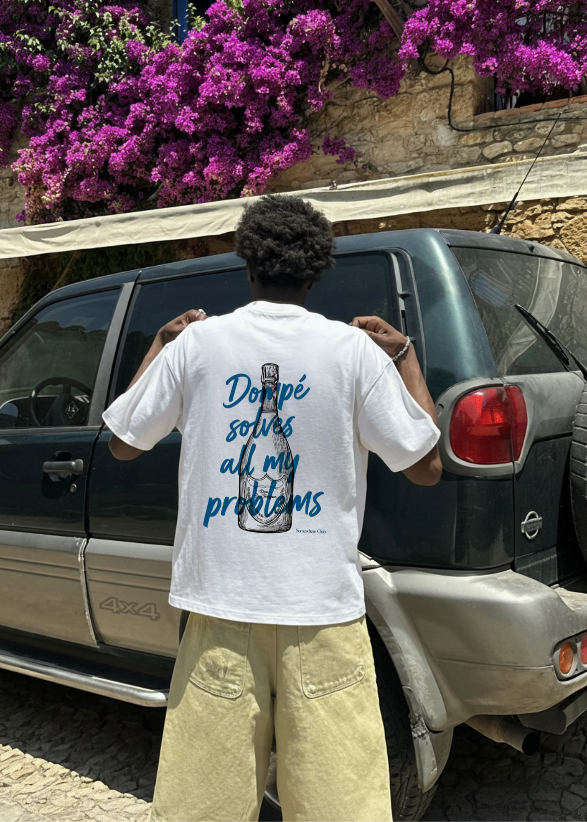 DOMPÉ SOLVES PROBLEMS TEE